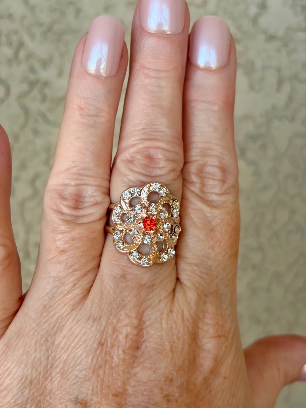 Intricate Rose Gold Floral Statement Ring with Orange Center Stone